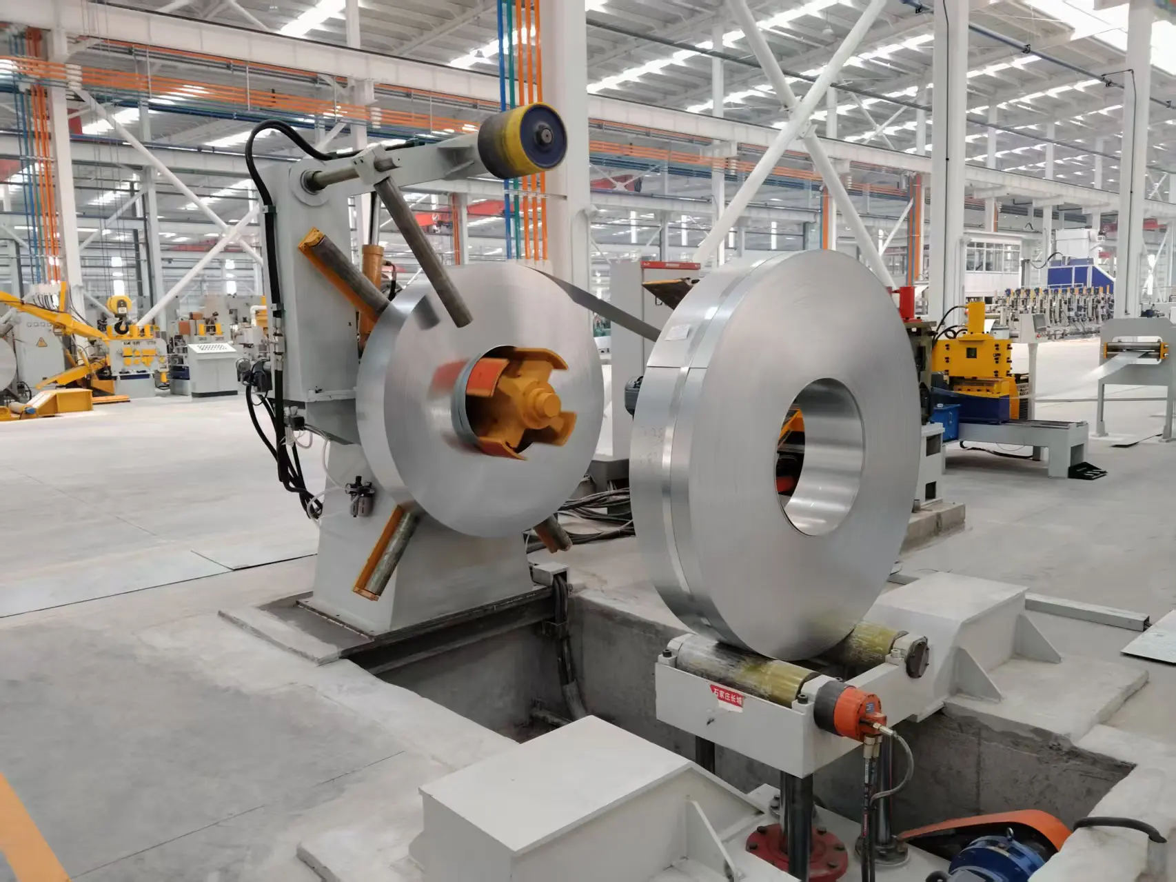 Why Does Your Welded Pipe Feed Line Require a High-Capacity Uncoiler Machine?